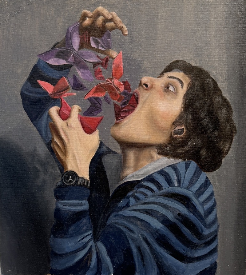 What appear to be paper birds fly out of a person's mouth.