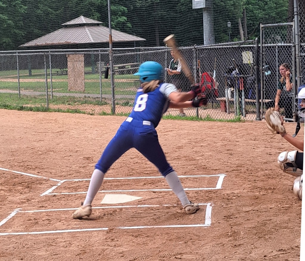 A batter at the plate is ready to swing.