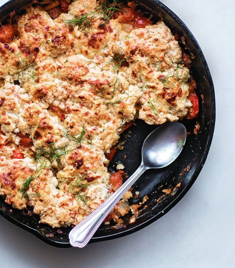 baked casserole in a black pan with
